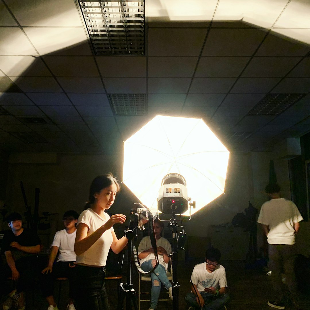 woman standing near the video camera